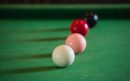 vecteezy_close-up-on-white-and-red-snooker-ball-or-pool-on-the_11555861-min-aspect-ratio-800-500